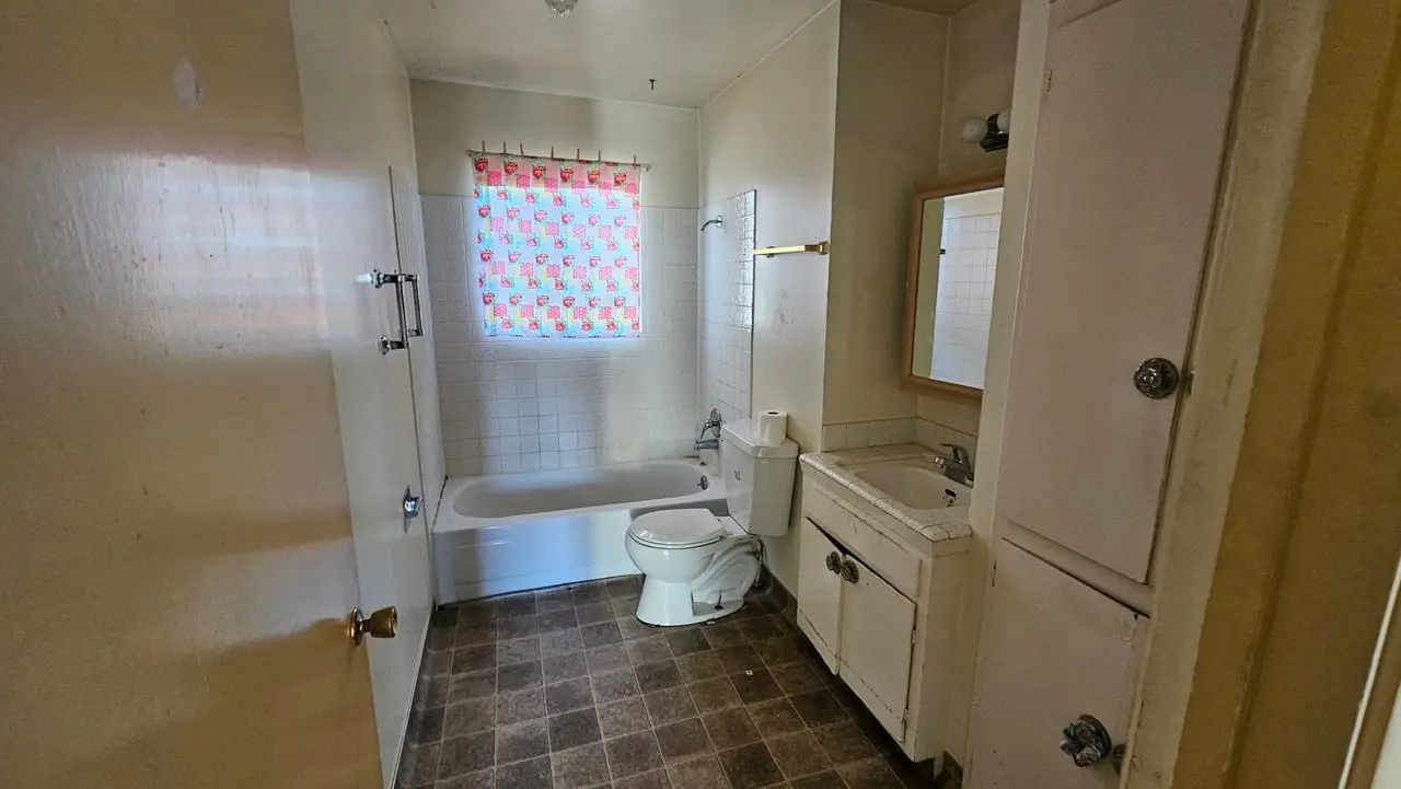 A worn-out bathroom before it was rebuilt